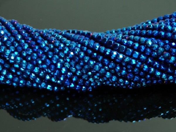 Hilo bola tallada hematite color azul 4mm